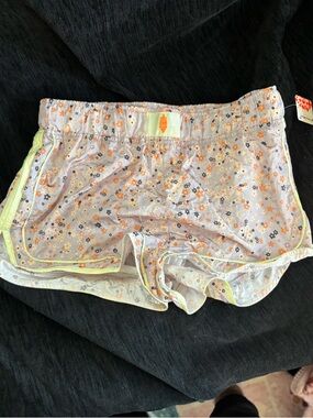 free people movement varsity blues shorts floral NWT